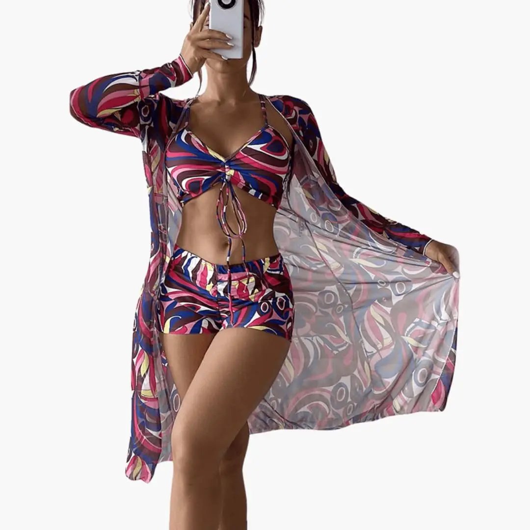 Women’s three-piece bikini set with V-neck tie-front top and sheer tie-dye cover-up by Wilfred Smith