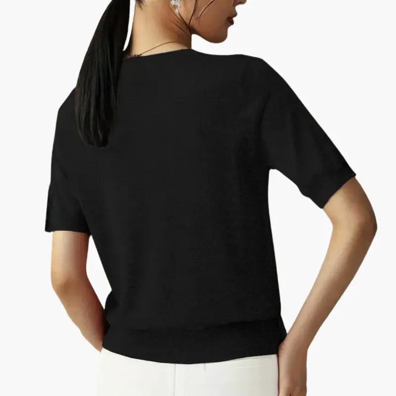 Women's black short-sleeve top in lightweight fabric, back view.