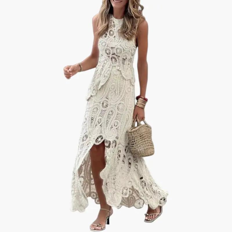 Women's two-piece openwork lace outfit in ivory by Wilfred Smith with an asymmetrical design