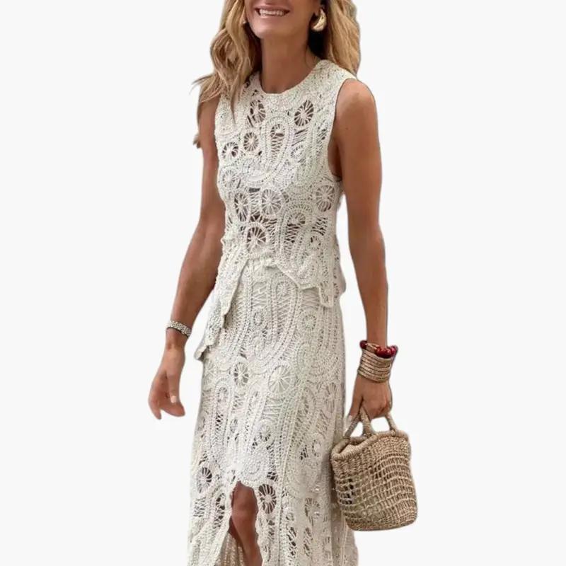 Women's two-piece lace openwork outfit in cream with asymmetrical design by Wilfred Smith