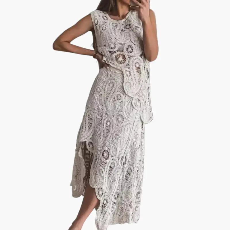 Women's two-piece lace outfit set with openwork and asymmetrical hem in cream by Wilfred Smith
