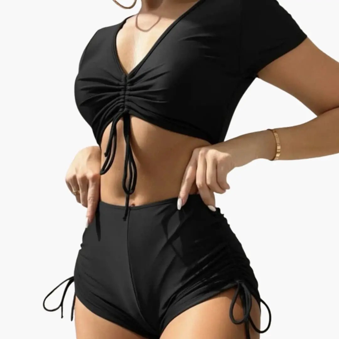 Women’s V-Neck Bikini Set two-piece by Wilfred Smith in black; backless ruched top and high-waist bottom with side ties.
