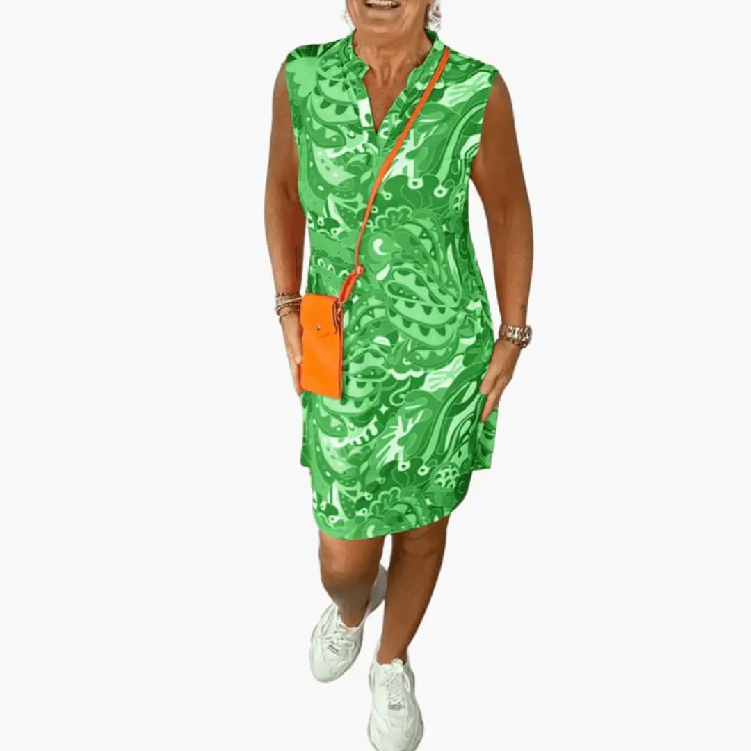 Women’s V-Neck Floral Midi Dress by Wilfred Smith with side pockets and short sleeves, green print