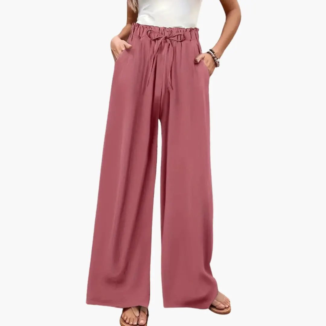 Women’s wide-palazzo pants by Wilfred Smith in dusty pink with elastic waistband and side pockets
