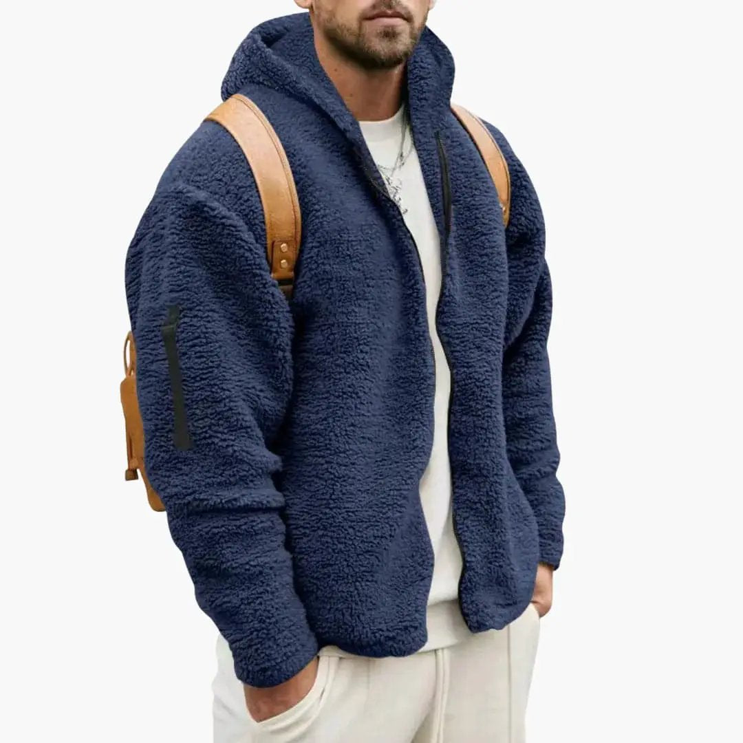 Warm hoodie jacket for men in navy sherpa fleece with tan backpack straps