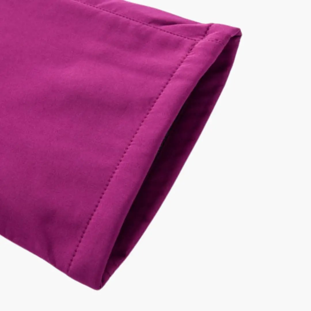 Women's hiking pants in magenta with zippered pockets