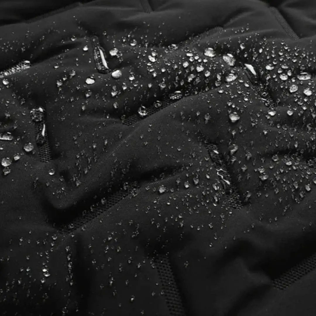 Men's black ski jacket with zippered pockets and water-repellent fabric.