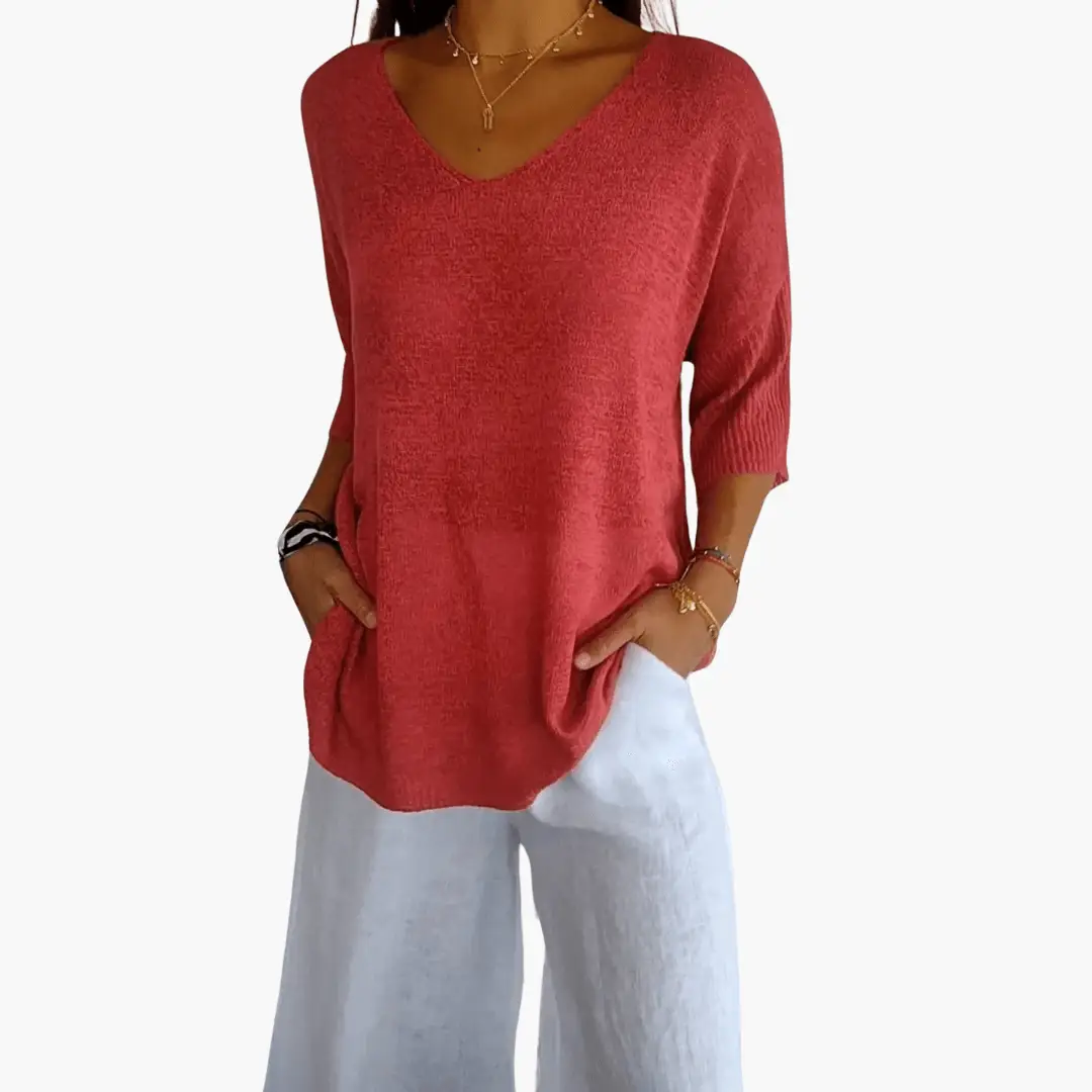 Women's red V-neck knit top, loose-fit with side pockets