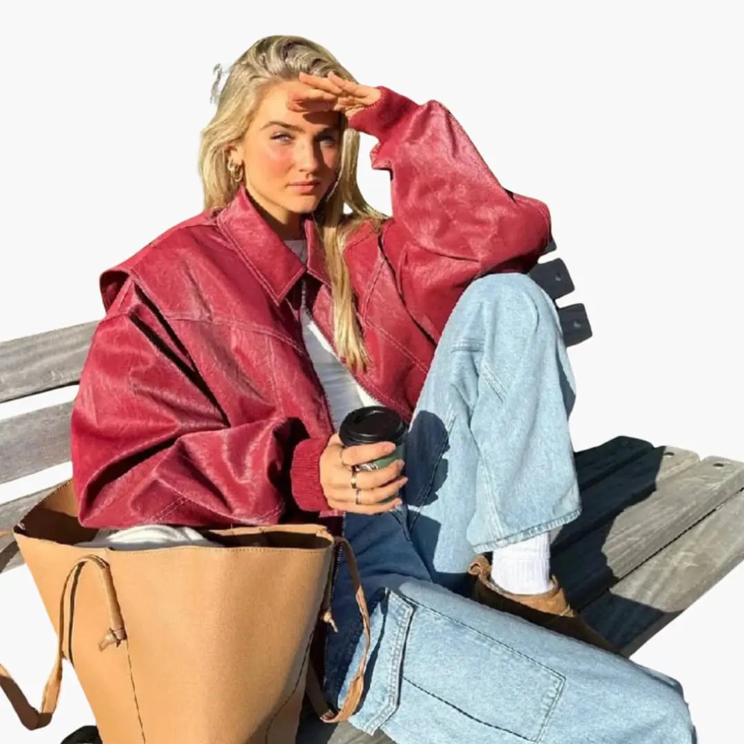Women's oversized red trucker jacket with long sleeves and contrast stitching
