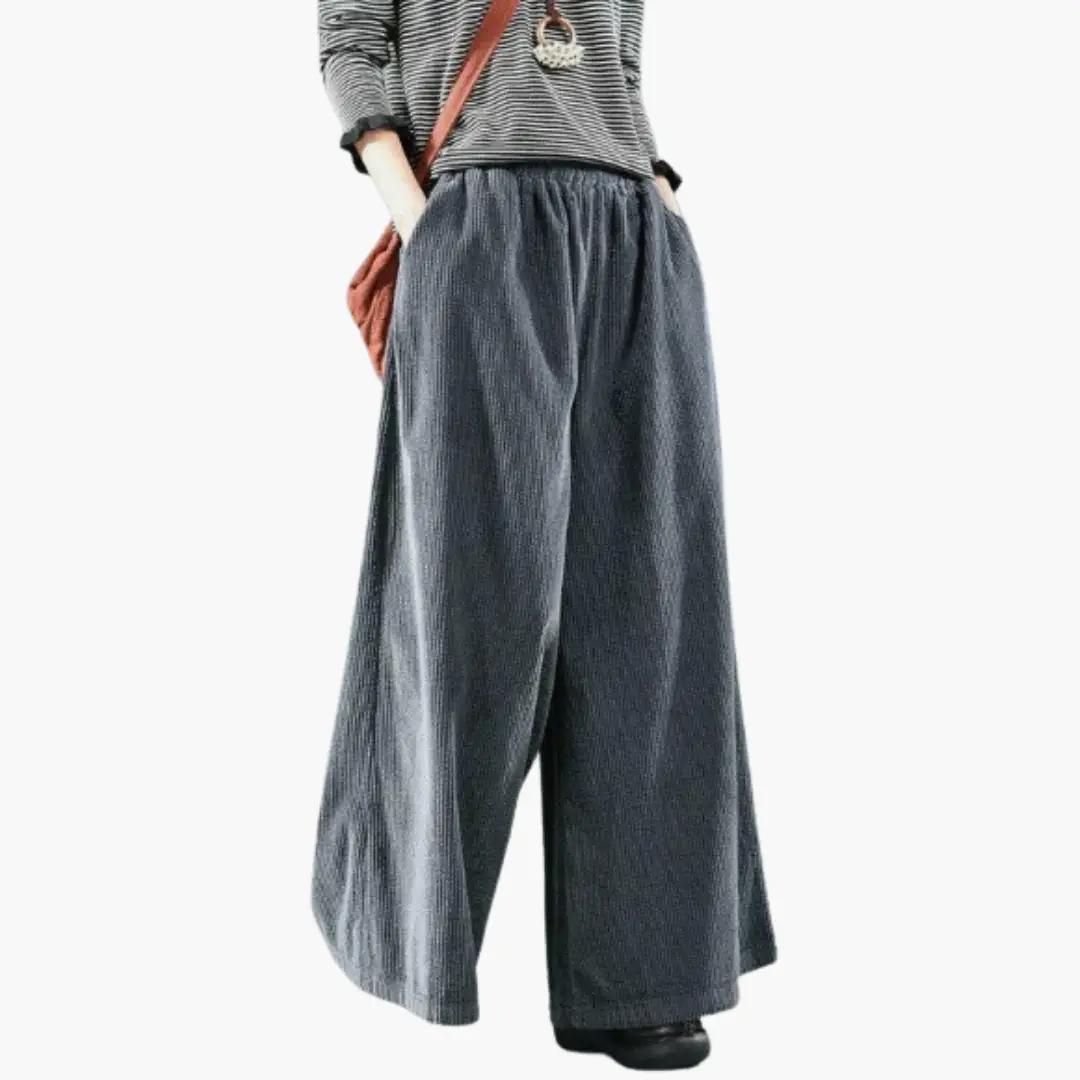 Women's corduroy trousers in dark blue with a straight leg.