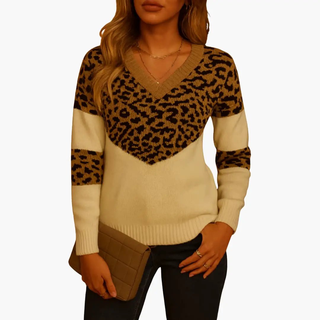Women's V-Neck Animal Print Knit Sweater; beige body with brown leopard pattern and long sleeves.