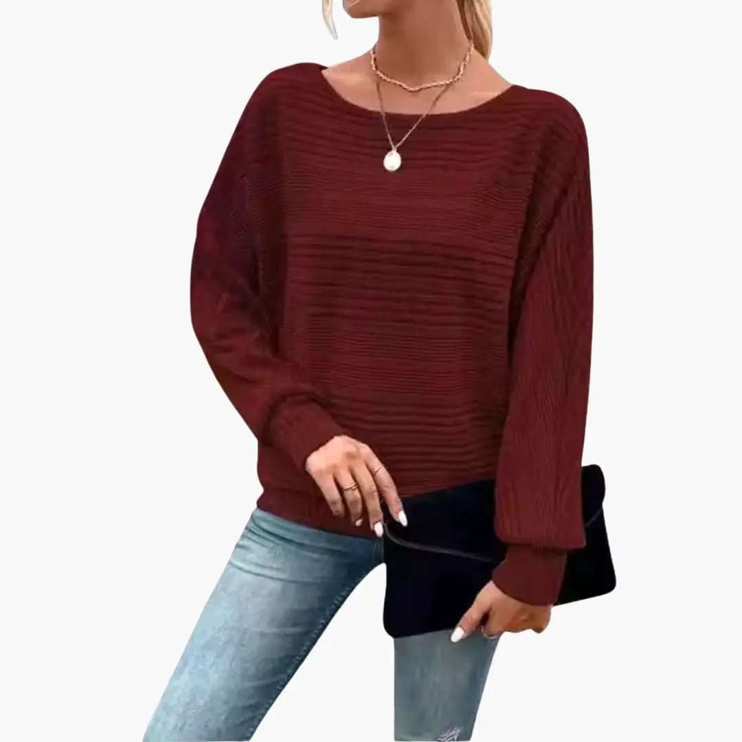 Women's burgundy striped knit sweater with boat neck and long sleeves