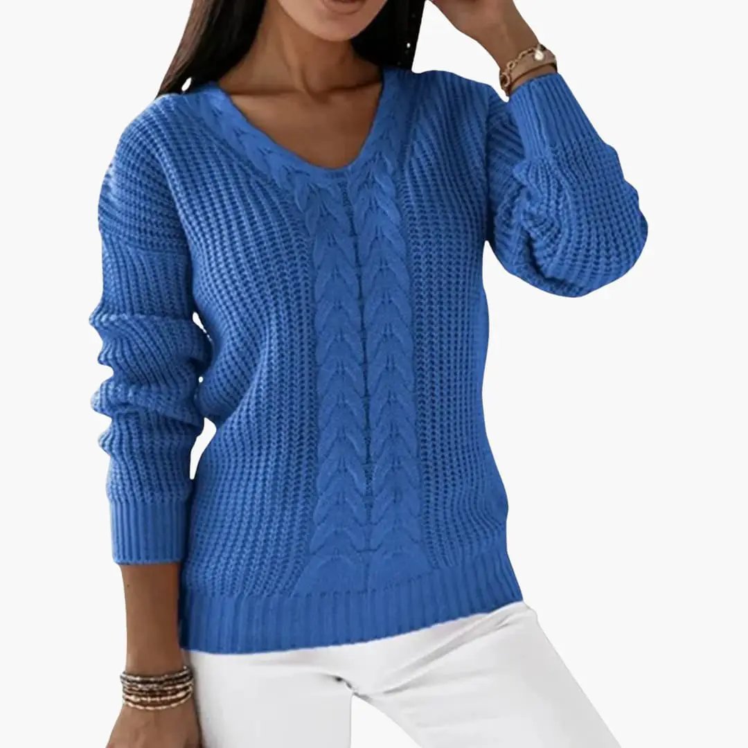 Women's blue V-neck pullover with cable-knit center panel and chunky knit texture
