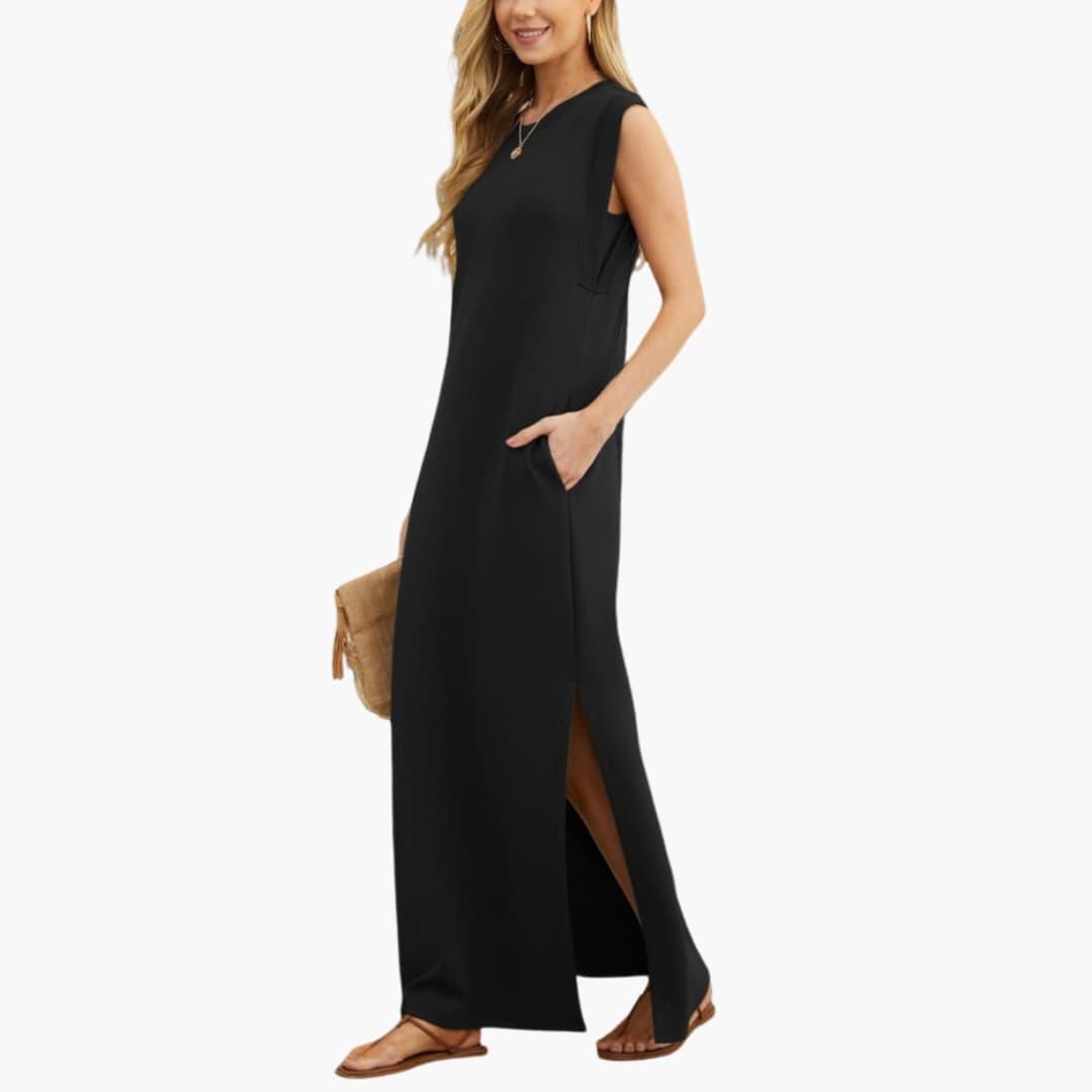Maxi dress for women by Wilfred Smith, black sleeveless with pockets and a side slit.
