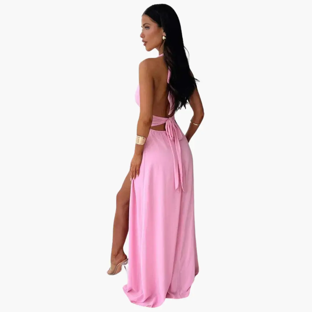 Maxi dress by Wilfred Smith in pink halter-neck with back tie and side slit