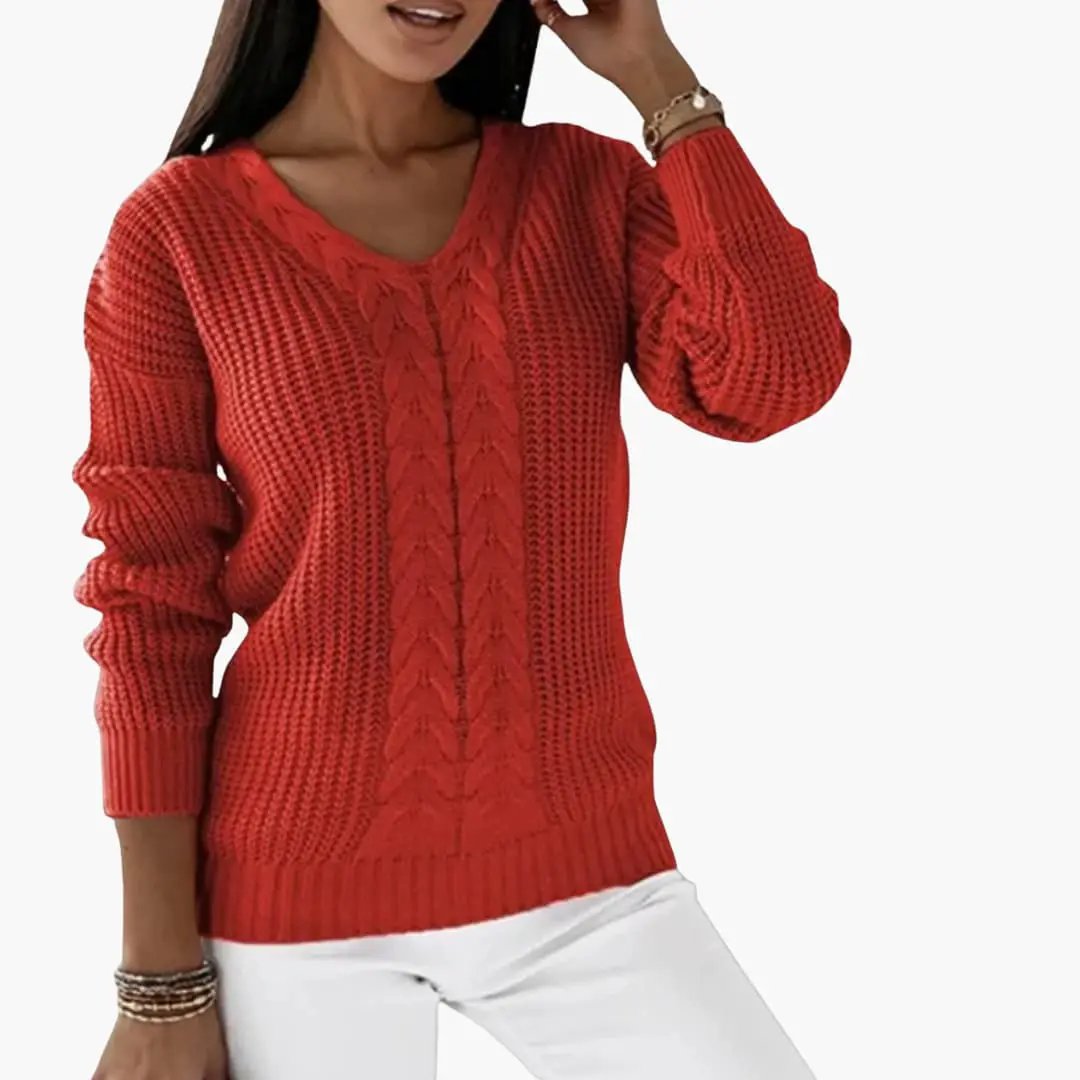 Women's red V-neck cable-knit pullover with chunky knit texture