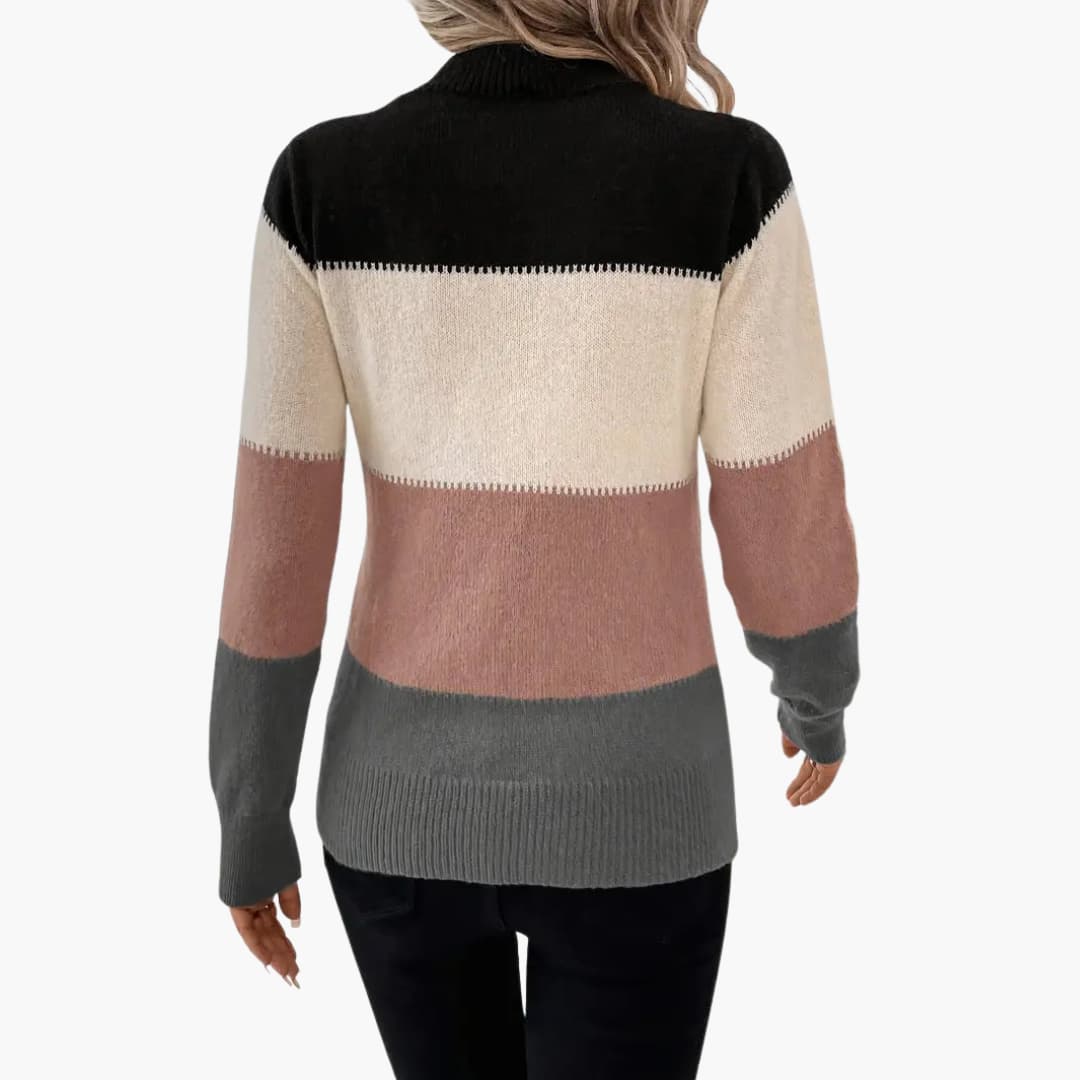 Women's colorblock knit pullover sweater with black, beige, dusty pink and gray bands (back view).