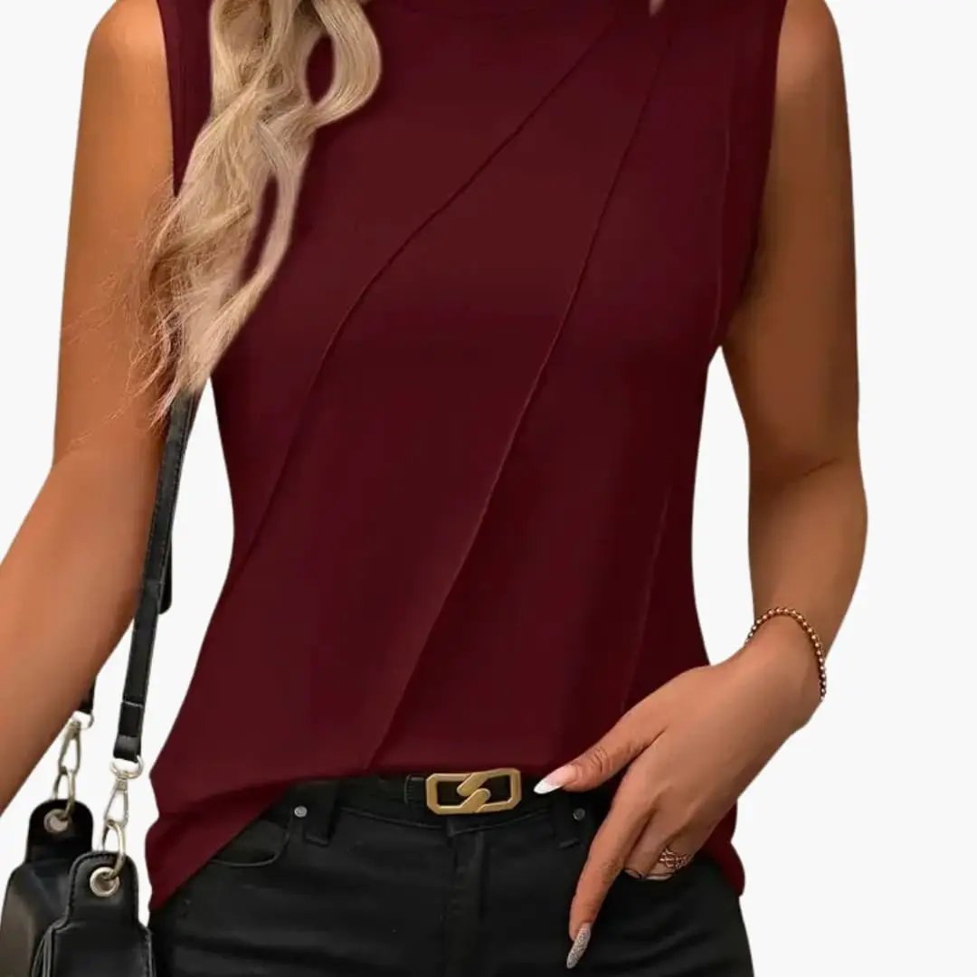 Women's burgundy woven sleeveless blouse with diagonal wrap seams