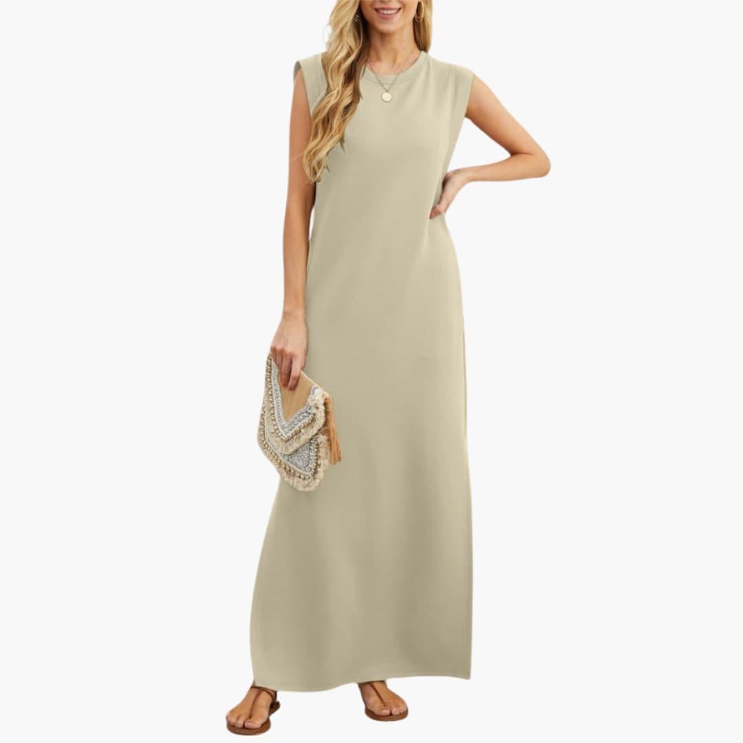 Maxi dress for women in beige; sleeveless, floor-length with woven clutch and sandals
