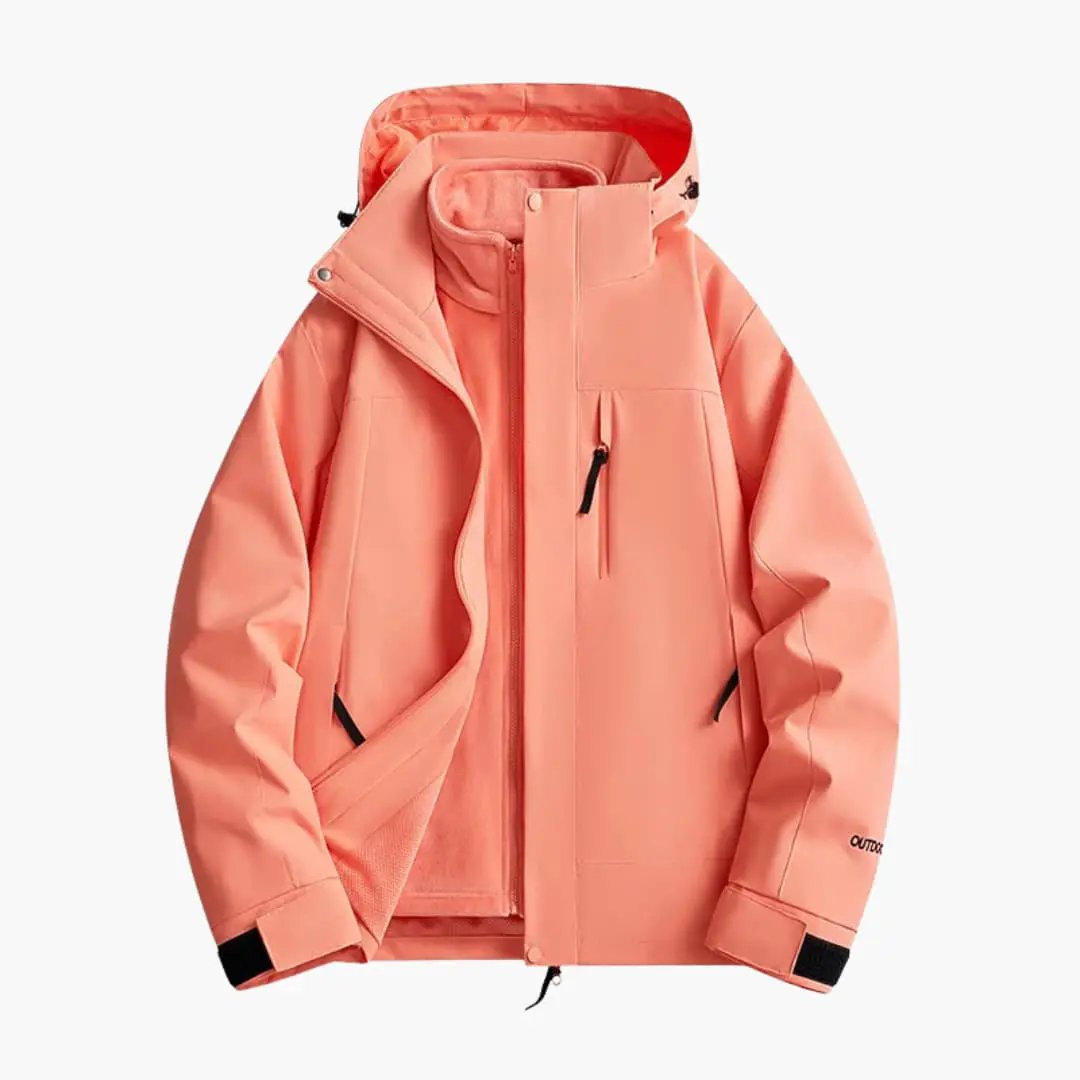 Unisex ski jacket with hood in coral pink by Wilfred Smith with zip pockets.