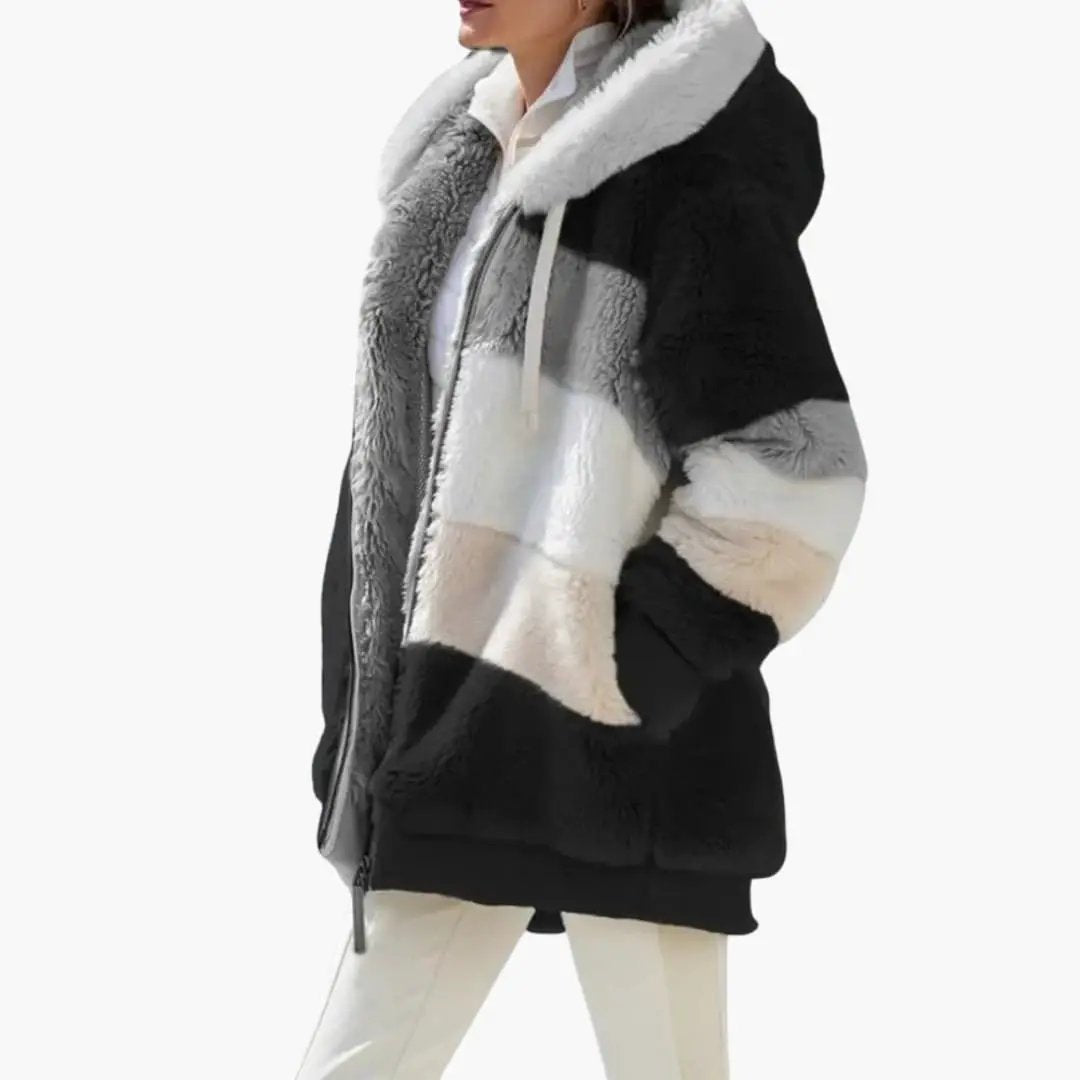 Women's hooded track jacket by Wilfred Smith, colorblock black white grey with plush faux fur texture.
