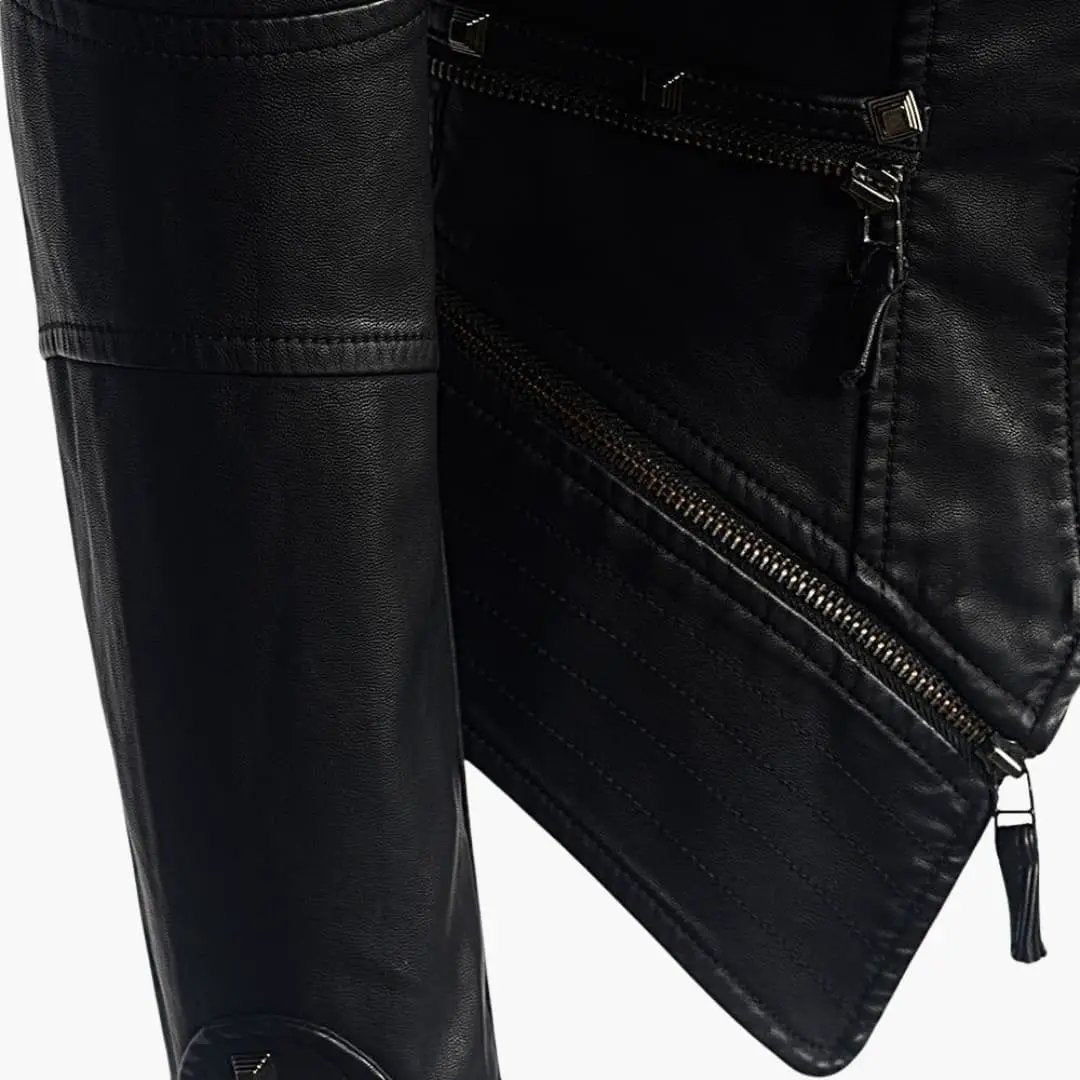 Women's biker jacket in black leather with studs and diagonal zip detail by Wilfred Smith