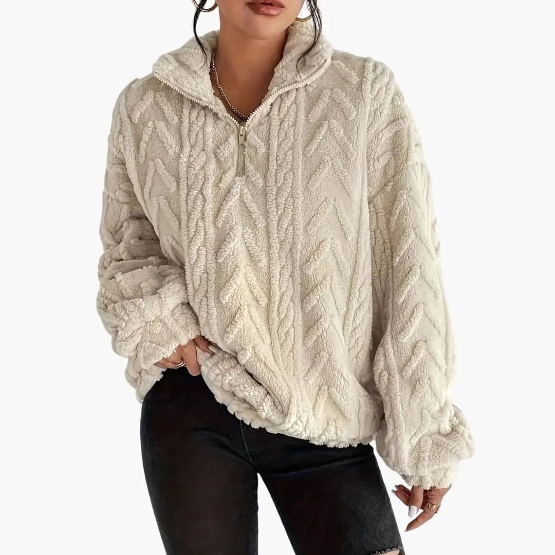 Women's fleece pullover by Wilfred Smith in cream sherpa with cable pattern and half-zip collar