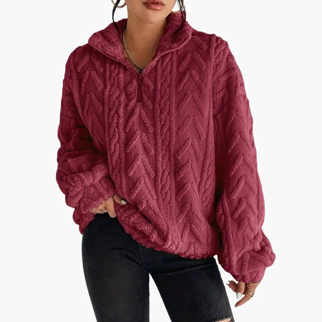 Women's fleece pullover with cable pattern in burgundy, zip-neck