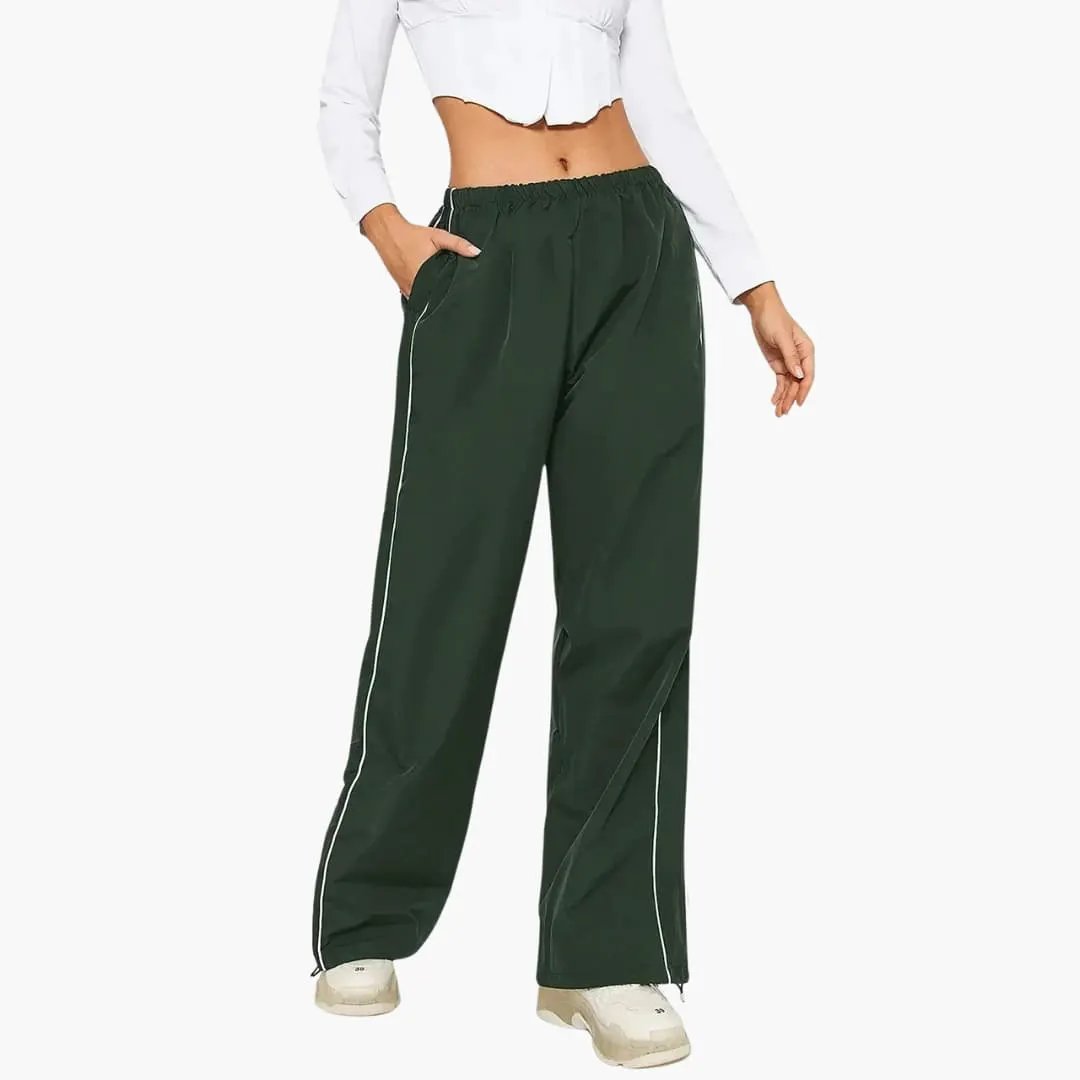 Women's jogging pants with side stripes in dark green, baggy fit