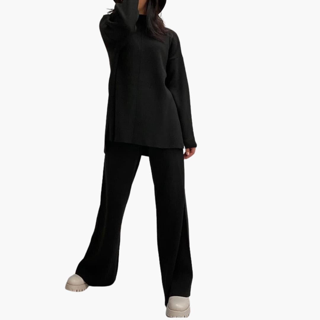 Women's two-piece black loungewear set with sweater and wide-leg pants