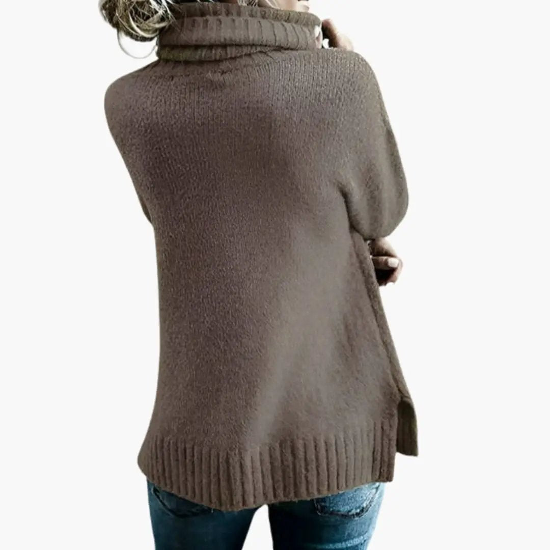 Women's oversized brown knit sweater with long sleeves, ribbed hem and side slits