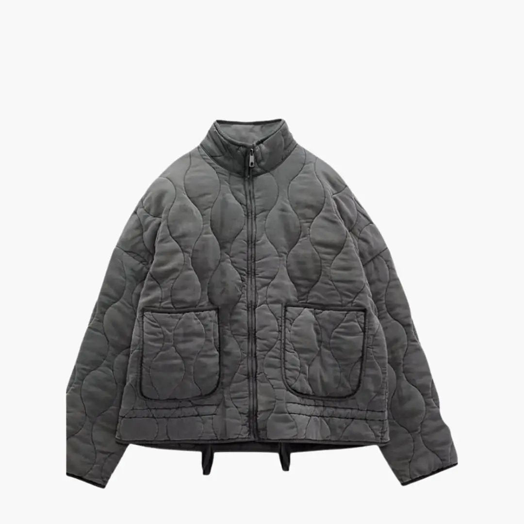 Women's Quilted Jacket with Zipper and Side Pockets in gray by Wilfred Smith.
