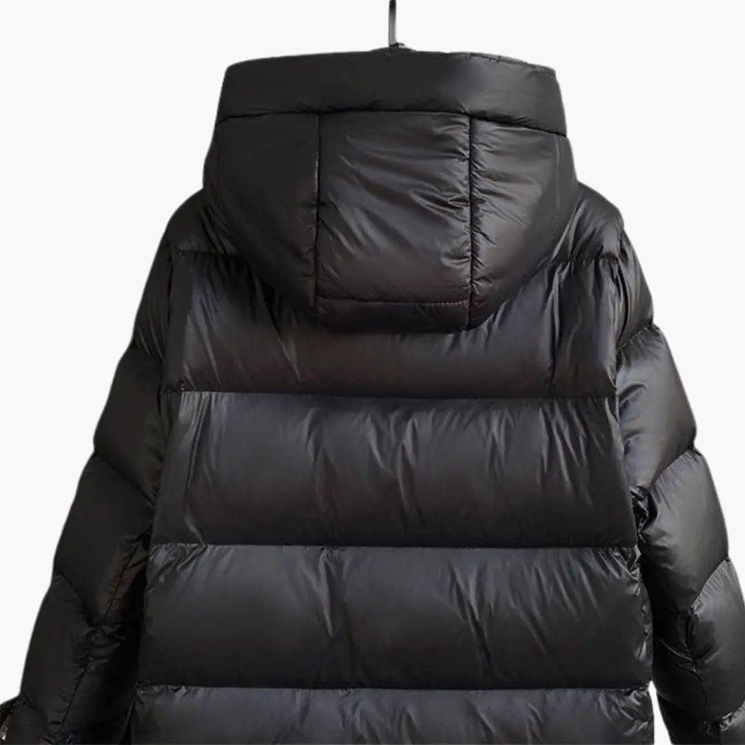 Women's long black padded puffer jacket with hood