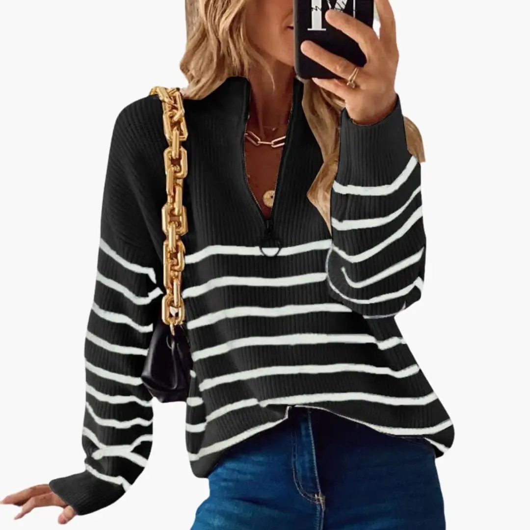Women's knit pullover with half-zip, black and white striped pattern, relaxed fit