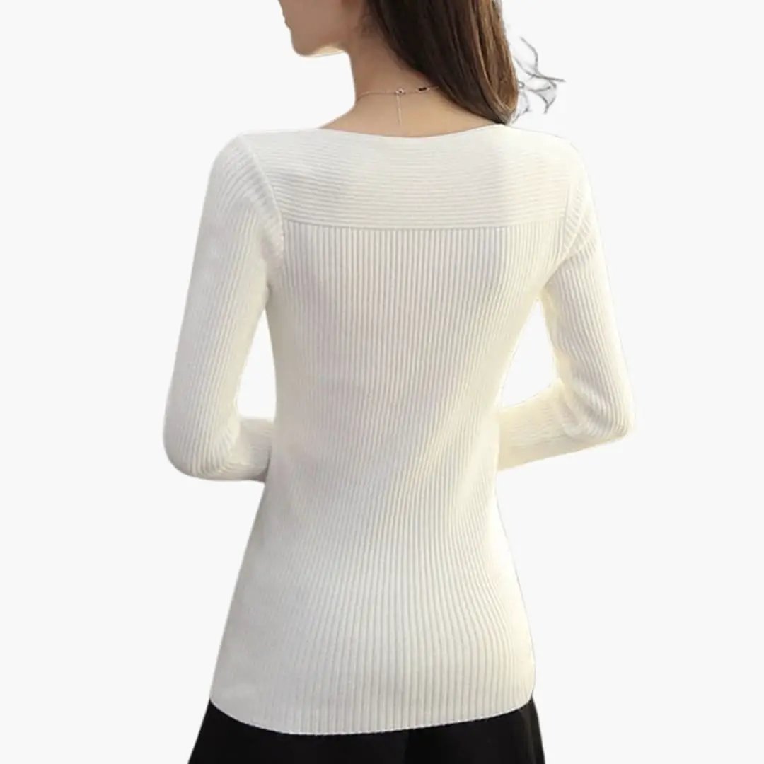 Women's knit sweater with long sleeves in white ribbed knit by Wilfred Smith.