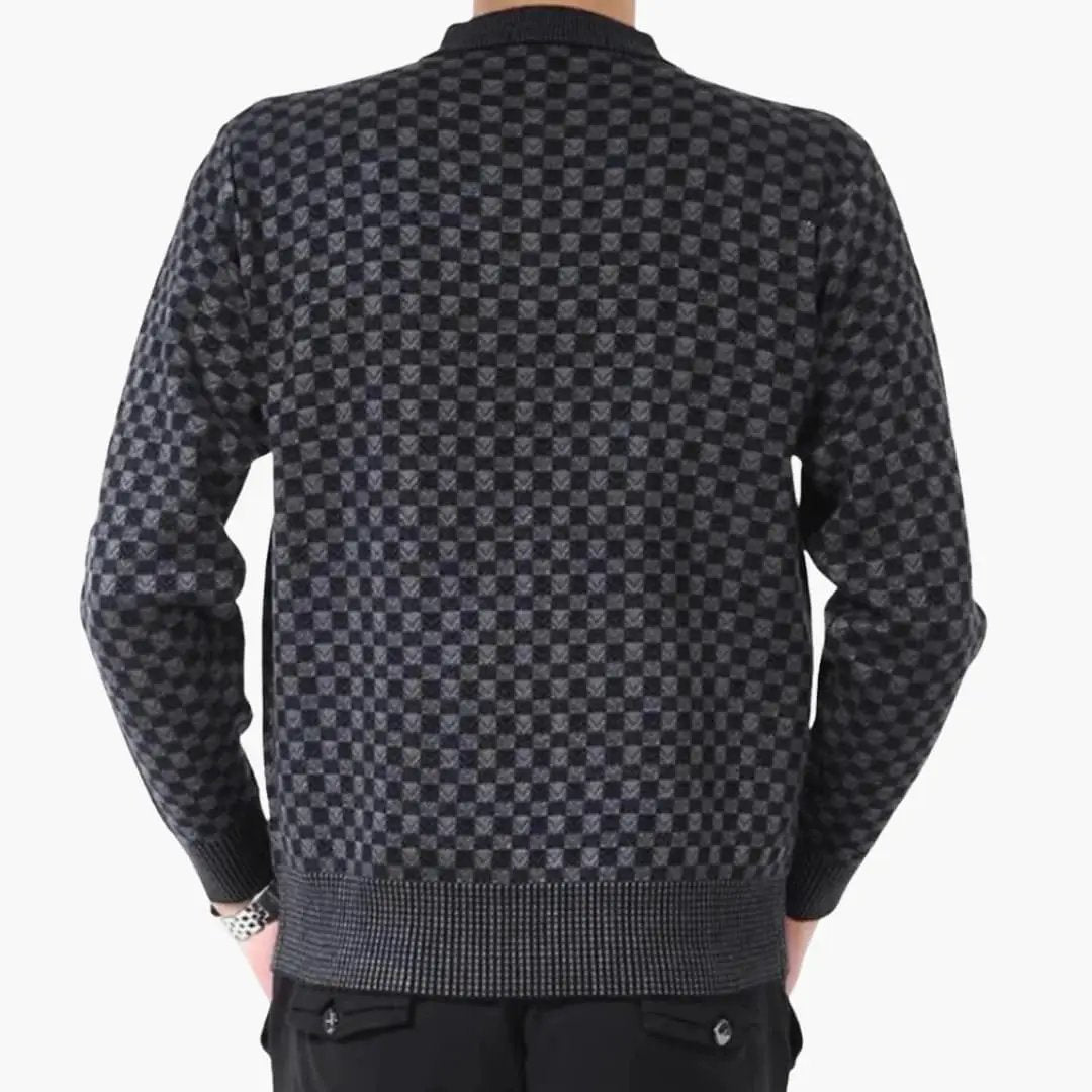 Back view of men's round-neck long-sleeve checkerboard sweater in charcoal black by Wilfred Smith.
