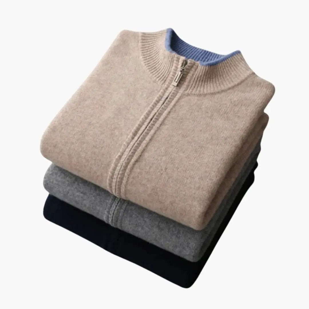 Men's zip-up cardigan with ribbed collar by Wilfred Smith; stack of four cardigans in beige, gray, and black.