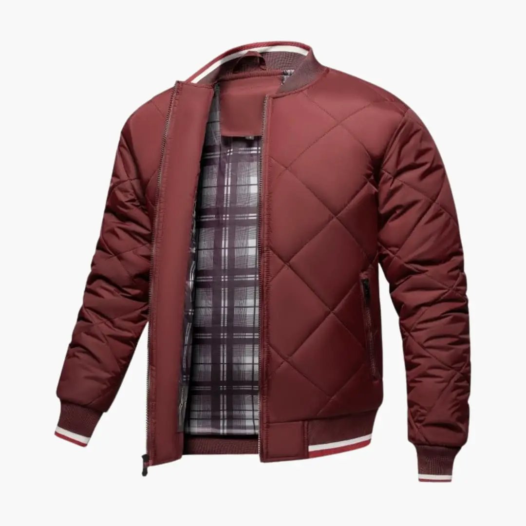 Men’s bomber jacket by Wilfred Smith, maroon diamond-quilted pattern with zipper front and plaid lining.