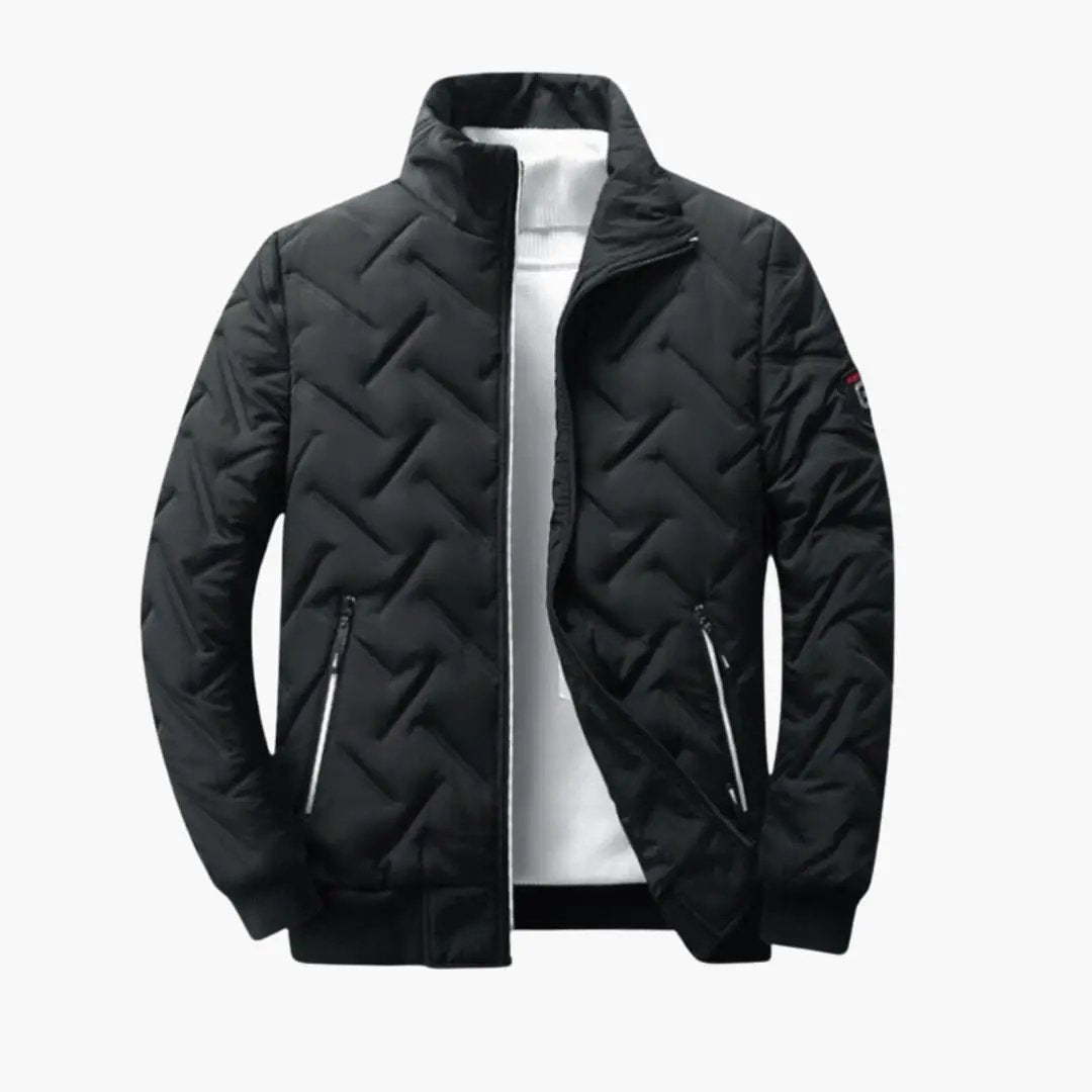 Men’s bomber jacket, black quilted with front zip and zippered side pockets; Wilfred Smith patch on sleeve.