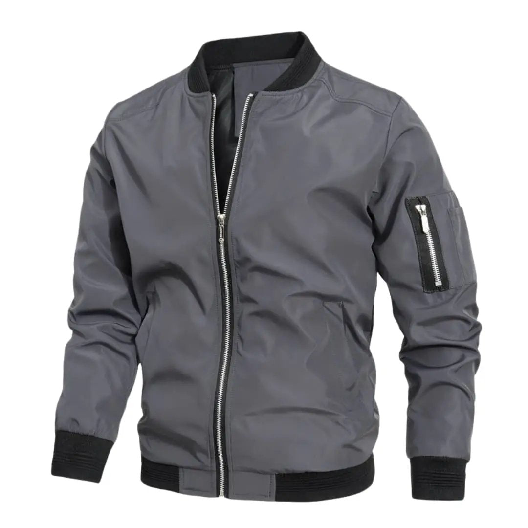 Men’s bomber jacket by Wilfred Smith in grey with zip front, black ribbed cuffs and hem, and sleeve pocket.