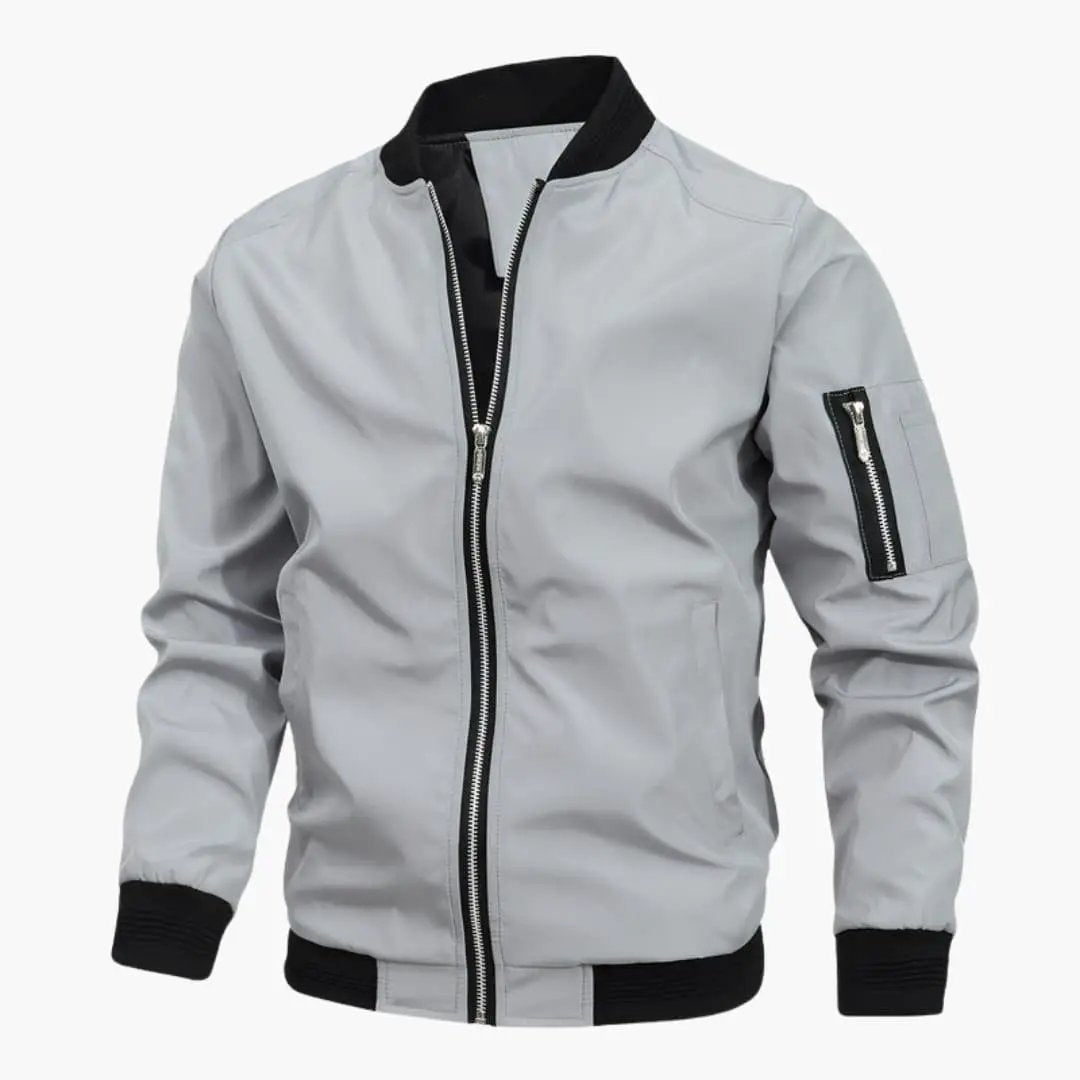 Men’s Bomber Jacket by Wilfred Smith, light gray with black ribbed collar and cuffs, front zip.