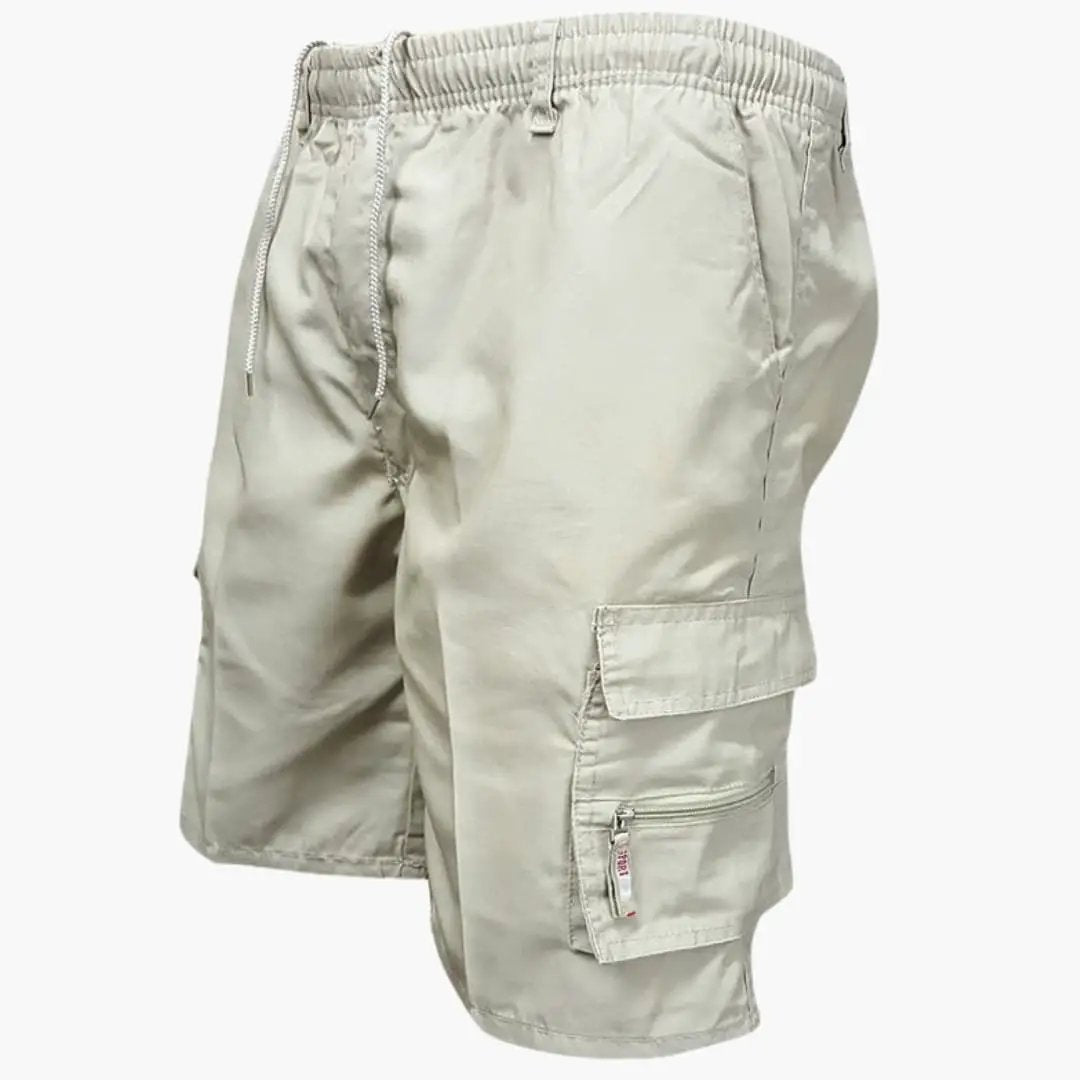 Men's knee-length cargo shorts by Wilfred Smith in beige with drawstring and flap pockets