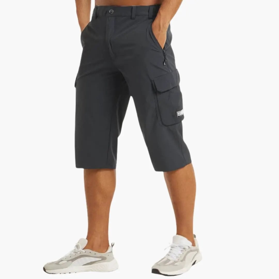 Men's cargo shorts by Wilfred Smith, knee-length dark gray with zip pockets.