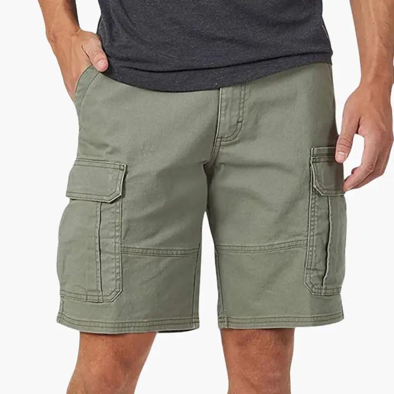 Men's cargo shorts by Wilfred Smith in olive green, knee-length with zippered and flap pockets, front view.