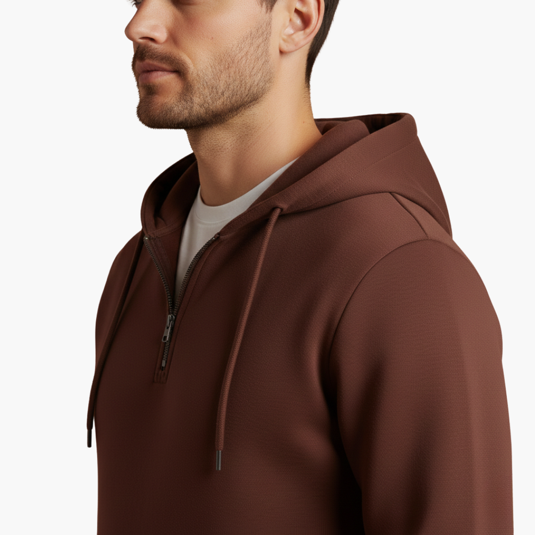 Men's half-zip hoodie in rust brown with hood and drawstrings
