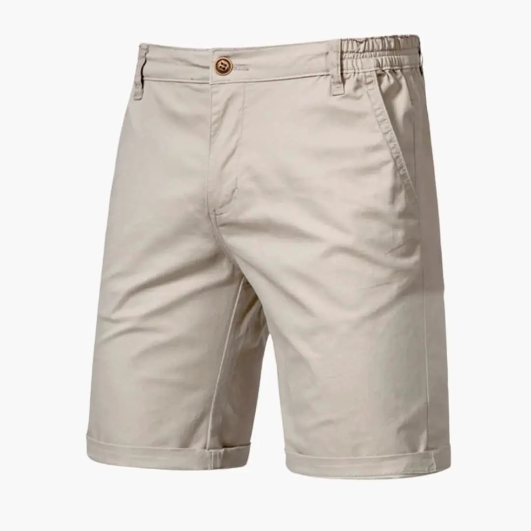 Men's knee-length beige chino shorts by Wilfred Smith with belt loops and zip closure
