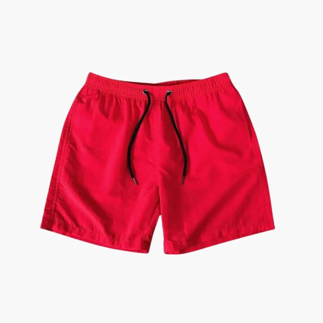 Men's knee-length jogger shorts by Wilfred Smith, red with drawstring and zip pockets.