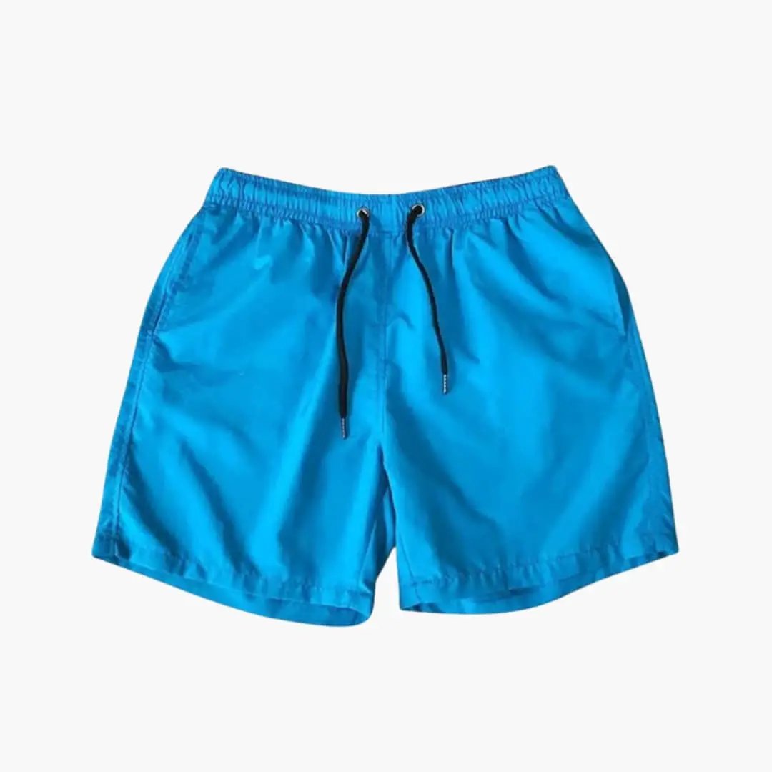 Men's knee-length jogger shorts by Wilfred Smith in bright blue with drawstring and zip pockets
