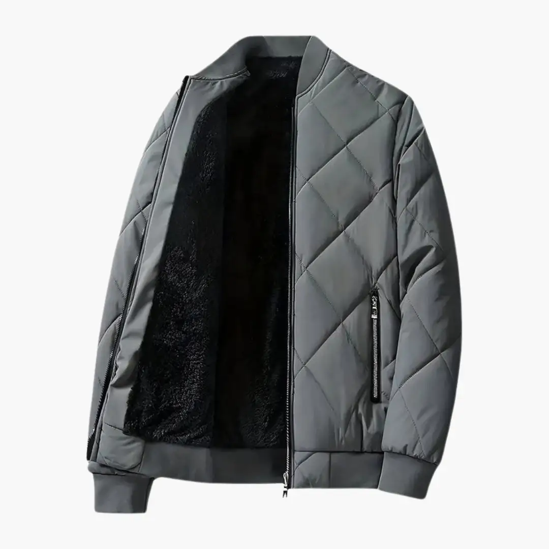 Men’s padded quilted jacket by Wilfred Smith with black fleece lining and zip pockets, gray