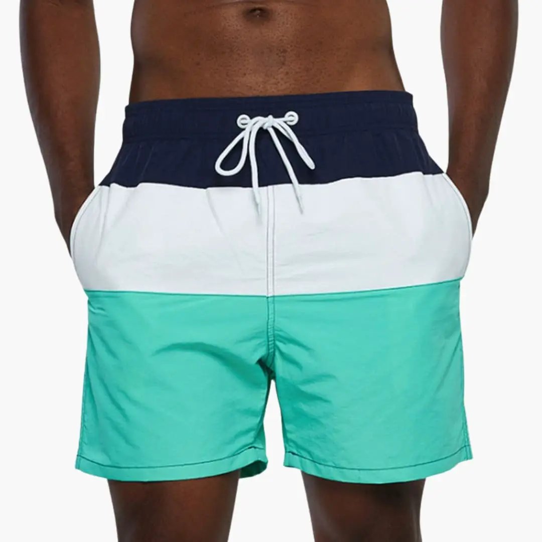 Men's Striped Swim Trunks by Wilfred Smith with navy, white and teal colorblock and drawstring waist